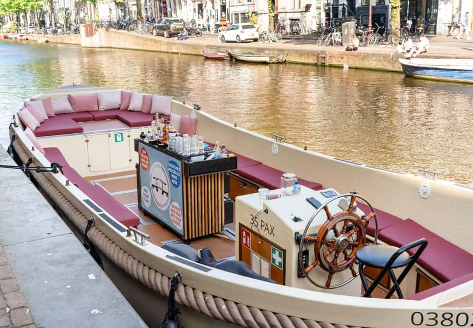 CHEESE AND DRINKS TOUR: A TASTE OF AMSTERDAM ON THE CANALS - Stopera, Herengracht, and the “narrow” feeling of Skinny Bridge