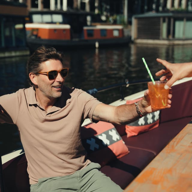 COZY AND FUN CANAL TOUR: A UNIQUE JOURNEY THROUGH AMSTERDAM - Live Guide Stories and Insider Tips: What You’re Paying For