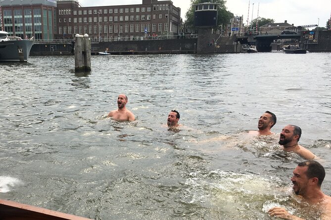 Cruise Amsterdam like a Local — Small Group 12 pax - Cold-weather comfort: heated boat, sliding windows, and extra blankets