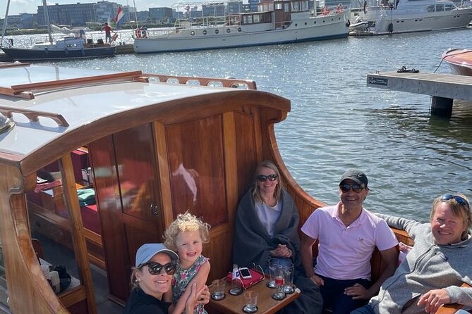Cruise Amsterdam like a Local — Small Group 12 pax - The Amsterdam canal ring route: bridges, the Amstel, and the sights you actually want