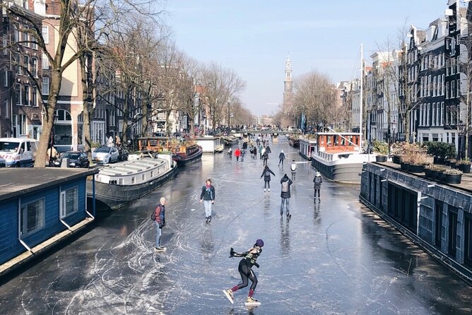 CULTURE with bite, culinary city tour - The Jordaan (40 minutes): canal life plus appeltaart met slagroom
