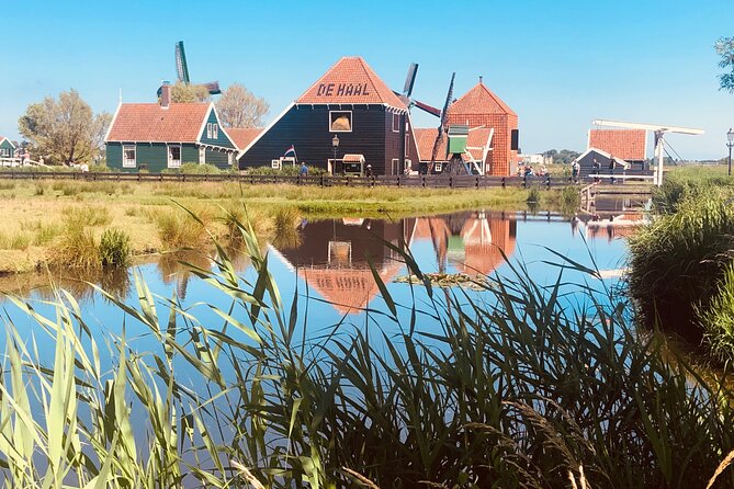 Dreamy Dutch Villages Tour: Giethoorn, Zaanse Schans & More - Zaanse Schans: windmills, green wooden houses, and water-control scenery