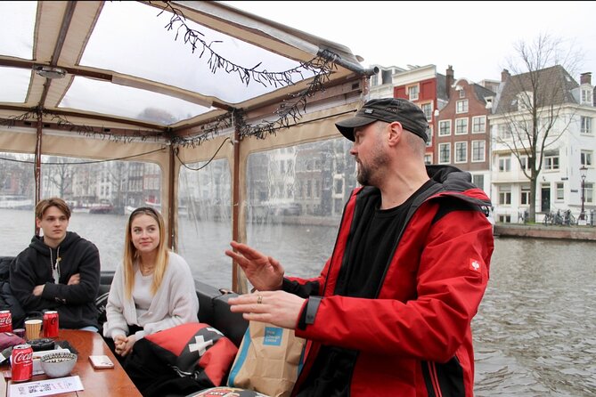 Dutch Cheese & Drinks Guided Amsterdam Boat Tour, All Inclusive - Getting started at Oudezijds Voorburgwal without losing the dock