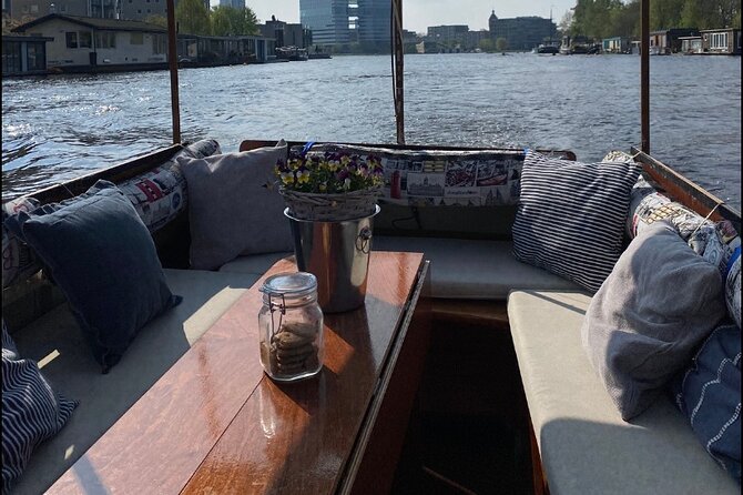 Dutch Cheese & Drinks Guided Amsterdam Boat Tour, All Inclusive - Munttoren and Magere Brug: minting coins and a bridge with romance lore