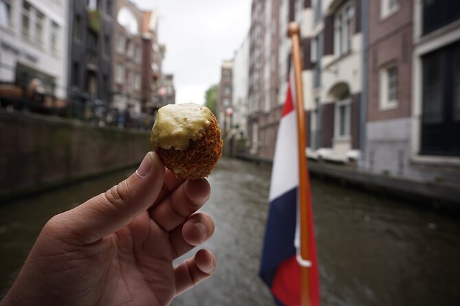Eating Amsterdam: Food Tour & Canals Cruise - Surinamese rotirol and poffertjes: the sweet-and-savory rhythm