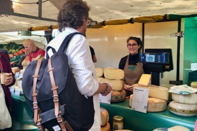 Exclusive Cheese Walk & Dutch Wine Discovery - The Spui book-market start: a local way to get oriented