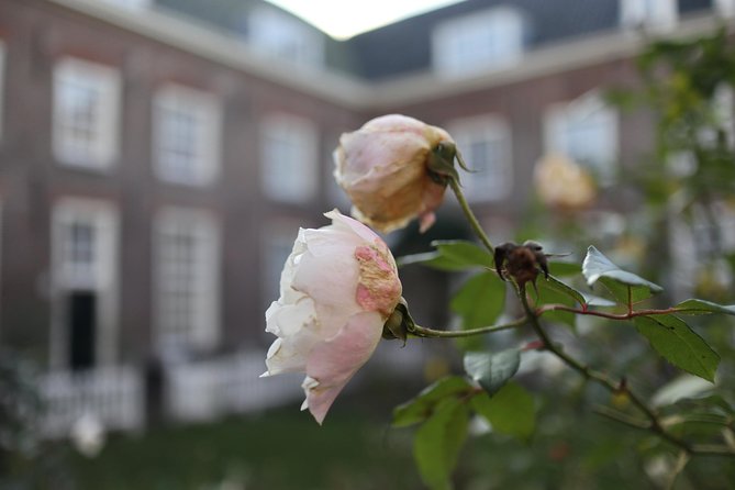 Explore hidden streets with friends - Karthuizerhof Courtyard and the Westerkerk Story With Rembrandt