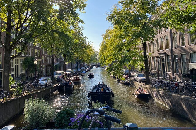 Explore hidden streets with friends - Private Tour - Beursplein to Dam Square: Amsterdam’s power story in plain language