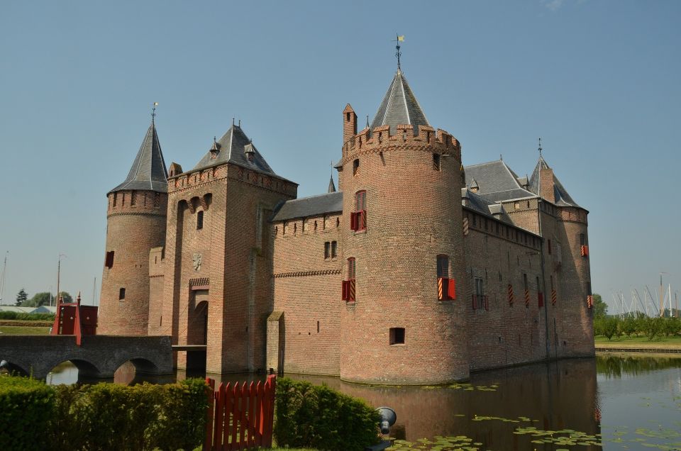 From Amsterdam: Amsterdam Castle Muiderslot Private Tour - Exploring inside: Medieval rooms, paintings, and audio help