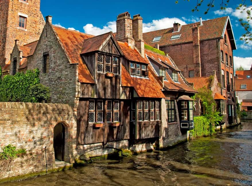 From Amsterdam: Bruges Full-Day Tour - Free time in Bruges: medieval streets, canals, and a chocolate plan