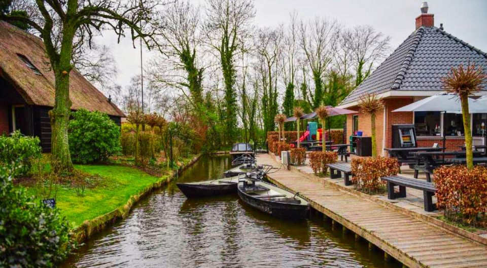 From Amsterdam: Giethoorn Guided Day Trip with Canal Cruise - Walking Giethoorn: Car-Free Charm, Bridges, and Thatched Roofs