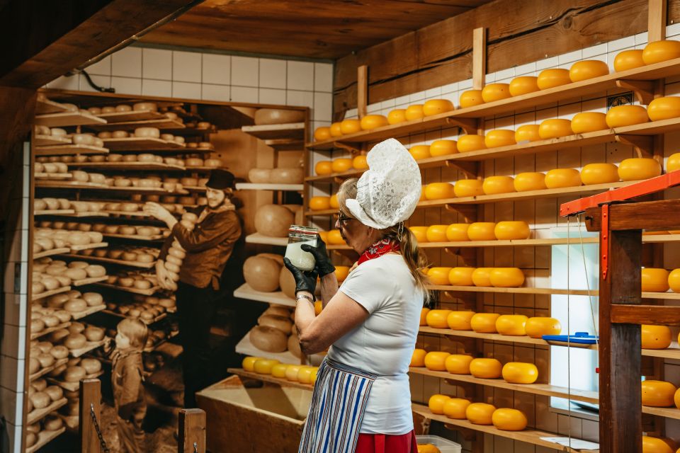 From Amsterdam: Giethoorn & Zaanse Schans Tour w/ Small Boat - Clogs and cheese: why these demos matter (not just a photo op)
