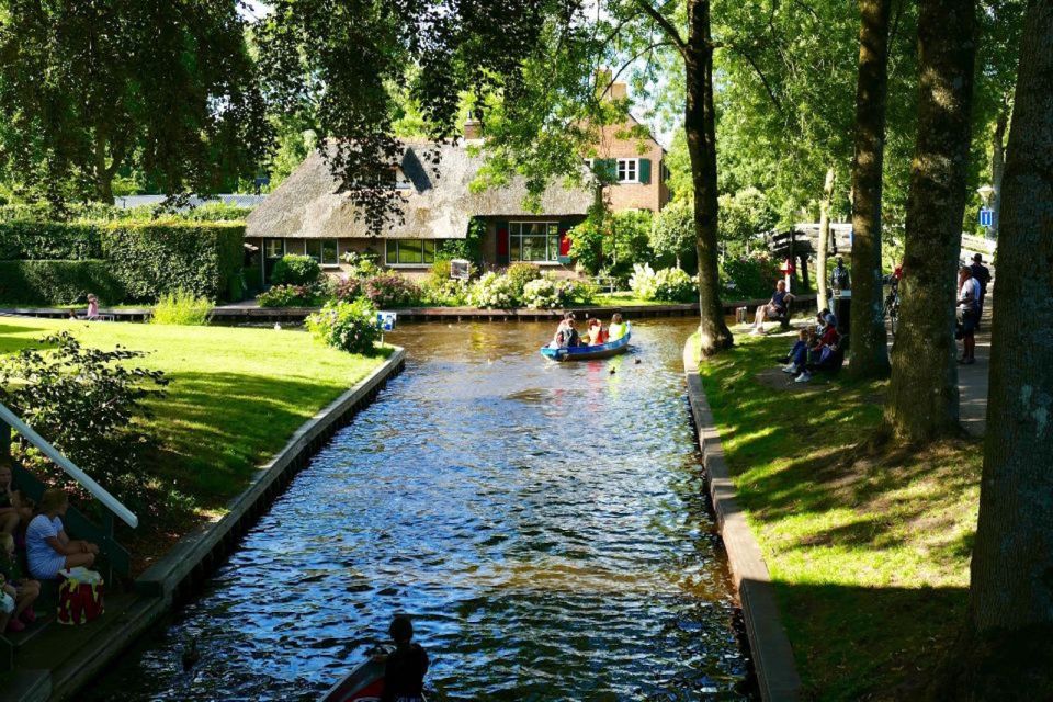 From Amsterdam: Private Tour to Giethoorn with Canal Cruise - From Amsterdam: the value of door-to-door transport