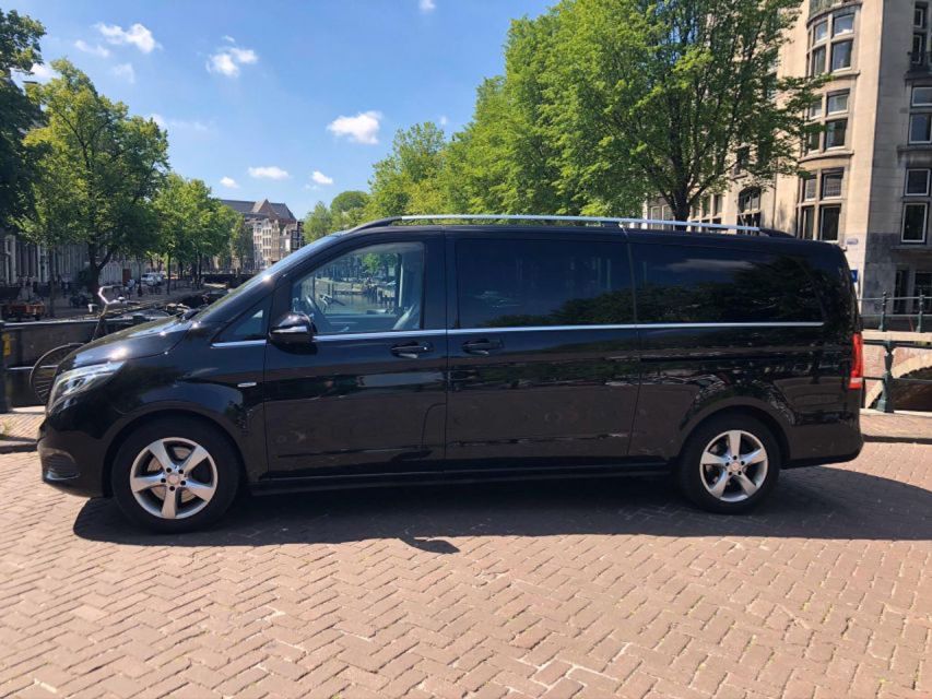 From Amsterdam: The Hague and Delft Sightseeing Tour - The Hague photo stops: Peace Palace, the International Court, and Parliament views