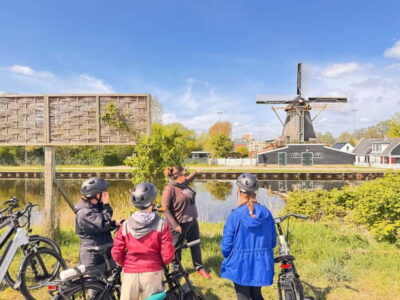 From Amsterdam: Zaanse Schans Windmills & More - E-Bike Tour - From Oudezijds Voorburgwal to Amsterdam-Noord: the start that sets the mood