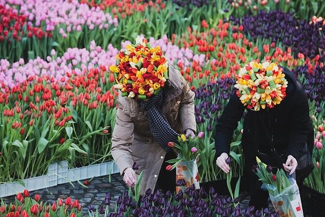Full-Day Trip From Amsterdam to Keukenhof, Zaanse Schans + Cruise - Cheese farm stop: learning Dutch cheese while you snack
