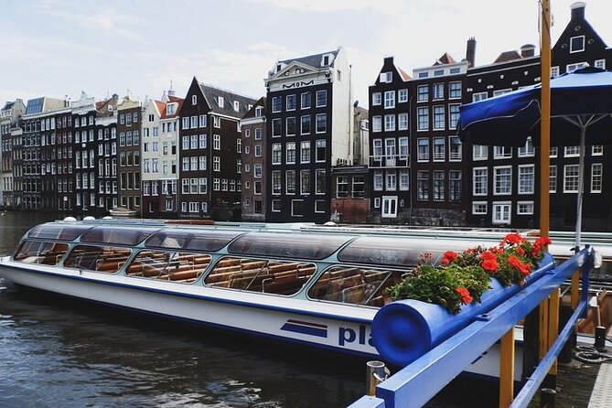 Full-Day Trip From Amsterdam to Keukenhof, Zaanse Schans + Cruise - Amsterdam canal cruise finale: Golden Age views after the countryside