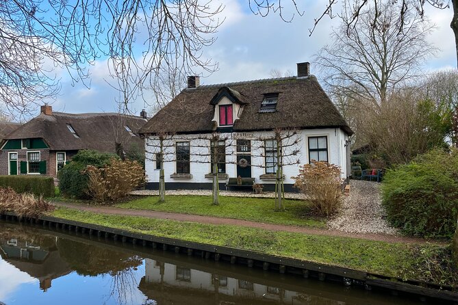 Giethoorn and Zaanse Schans Day Tour Small Group Incl. Boat Ride - The Drive to Giethoorn: Trading City Streets for Quiet Canals