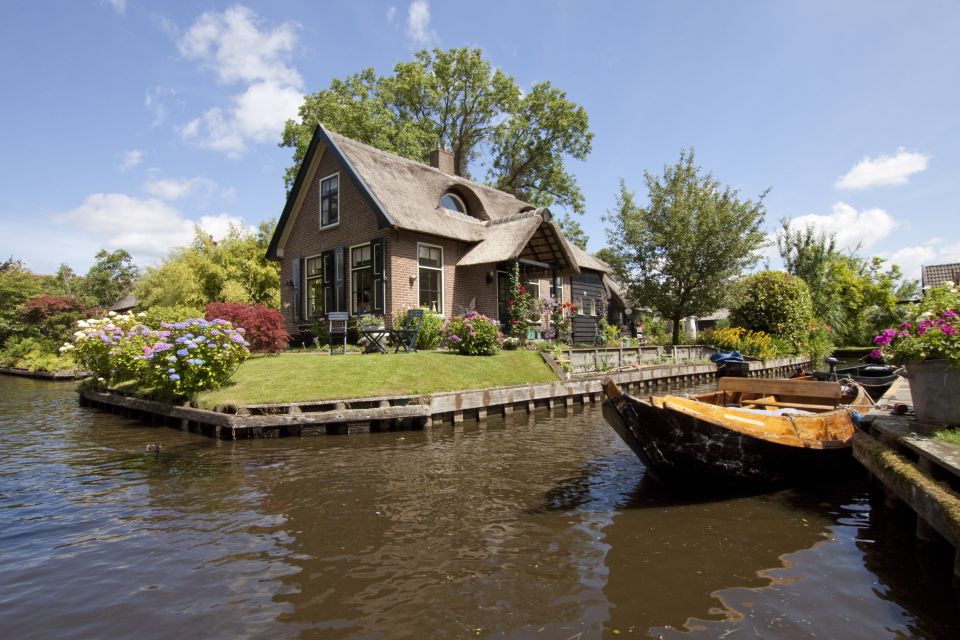 Giethoorn: Private Day Trip with Boat Tour from Amsterdam - Hotel pickup to Giethoorn: the time-saver you actually feel
