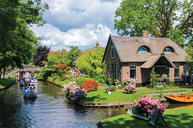 Giethoorn Private Tour Guide Giethoorn in luxury Jaguar S Type - A Word on the Guide Experience: Calm, On-Time, and Built for Families