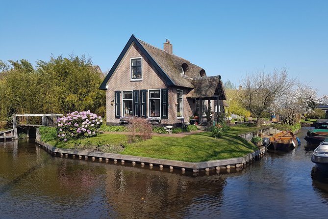 Giethoorn Small-Group Tour from Amsterdam (Max. 8 People) - The first star of the show: an early 1-hour private canal boat