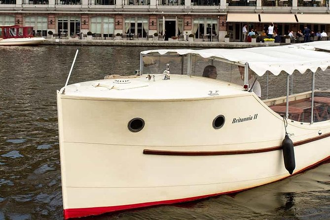 Guided Amsterdam Canal Cruise – Snacks & Drinks on board(1 Hour) - Cultural heritage and remembrance: a district with heavier stories