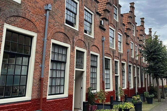 Haarlem Private Day Trip from Amsterdam with Local - Stop 5: Molen De Adriaan Museum, windmill landmark plus prison history