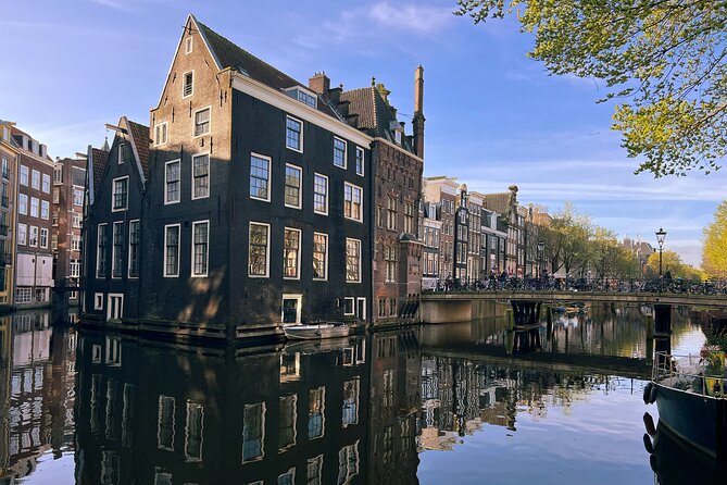 Historical Walking Tour, private with local Dutch guide - Het Kleinste Huis van Amsterdam: Small House, Big Meaning