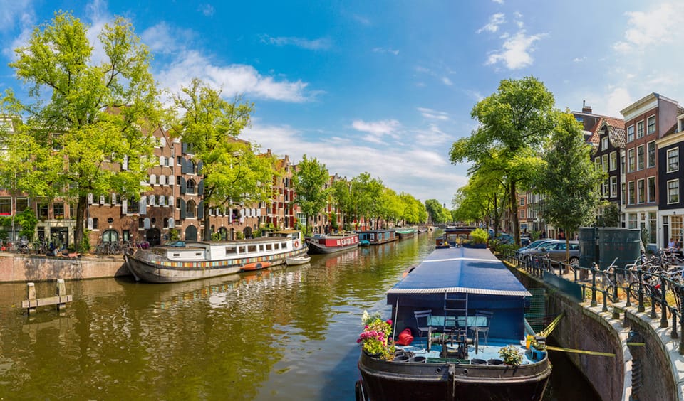 Jordaan, Anne Frank and Leidseplein tour in English - Canal Ring on Foot: Merchant Palaces, Houseboats, and a Narrow Surprise
