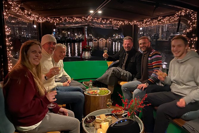 Light Event Amsterdam by small boat, 8 passengers max! You won't find any better - The cruise itself: live commentary that helps you see more