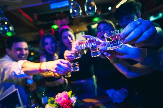 New Year's Eve Pub Crawl With Optional Club Entrance - The drink-and-games middle: free shots plus prizes