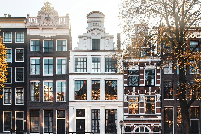 Personalized Hidden Gems of Amsterdam Private Tour with a Local - St. Nicholas Basilica, “dancing houses,” and the option to see the dome