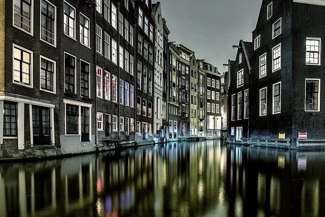 Private Amsterdam Bike Tour with a local guide (also for families) - Dam Square and Damstraat: the city’s starting point, made walkable by bike