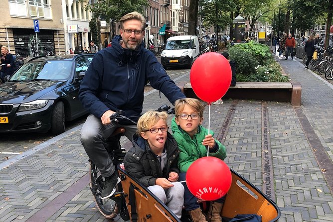 Private Amsterdam Bike Tour with a local guide (also for families) - The classic station hub finish and why it helps you keep exploring