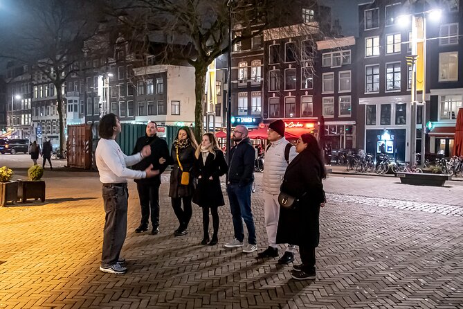 Private Amsterdam Red Light District tour including sex museum - Old Amsterdam stops: Dam, wooden poles, the Waag, and tiny surprises