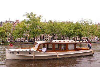 Private Champagne Canal Cruise in Amsterdam - Where you meet on Prinsengracht and how the 1.5 hours plays out