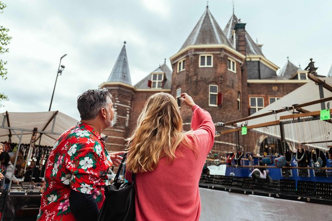 Private City Kickstart Tour: Amsterdam - Bloemenmarkt and Begijnhof: flowers and hidden medieval calm