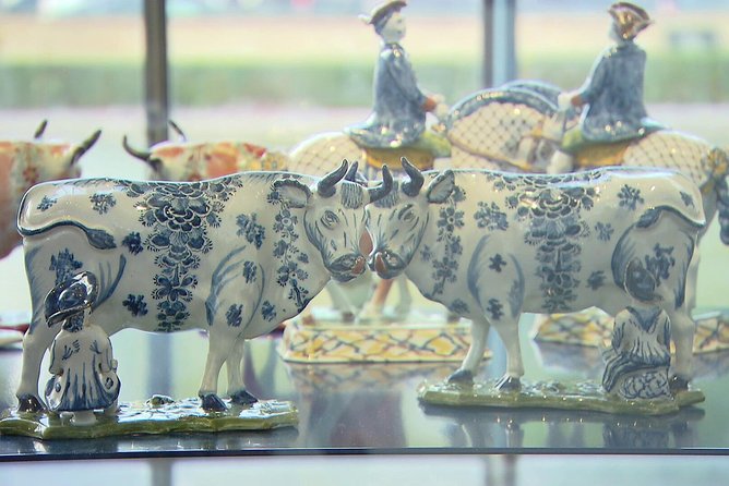 Private Day Tour: Rotterdam, Delft & The Hague From Amsterdam - Markthal: a food-and-shopping break inside a horseshoe-shaped landmark