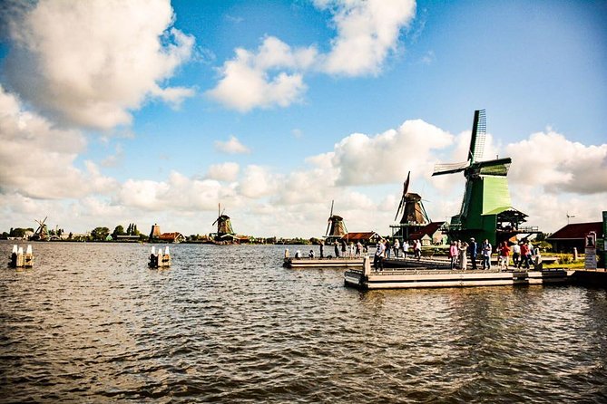 Private Daytrip Giethoorn and Windmills of Zaanse Schans from Amsterdam - Giethoorn by Canal: The 1-Hour Boat Ride That Sets the Mood