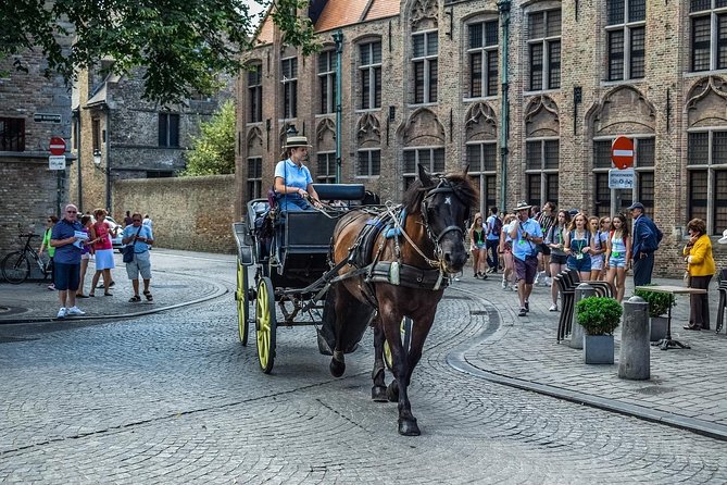 Private Sightseeing Day Trip to Ghent and Bruges from Amsterdam - Gravensteen Castle: Wouter Deprez Audio Guide and Included Entrance