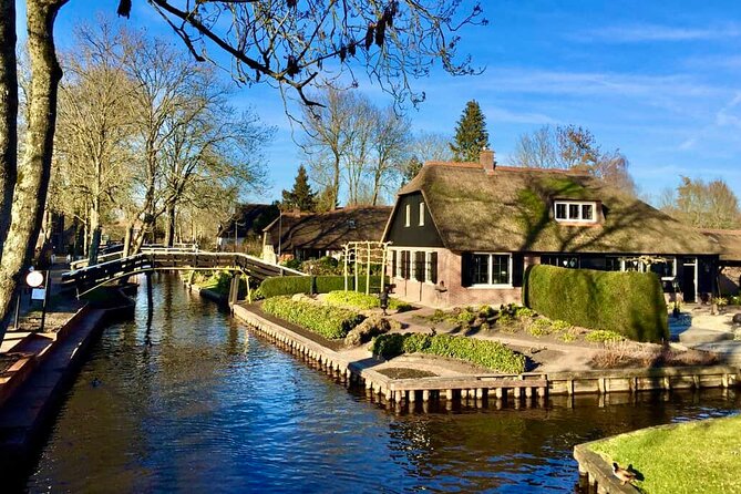 Private Tour to Giethoorn with boat and Zaanse Schans windmills - Guides make the difference: Ibrahim and Eva as a clue
