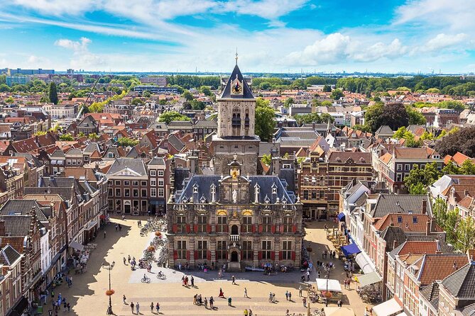 Private tour to Kinderdijk windmills and Delft from Amsterdam - Boat time and the pumping station: seeing it from the water