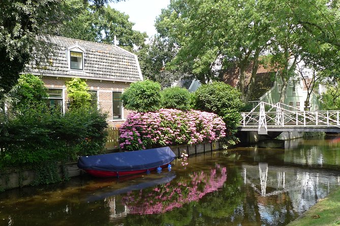 Private Tour Zaanse Schans Windmills and Volendam in Jaguar - What you should plan for: tickets, lunch, and footwear