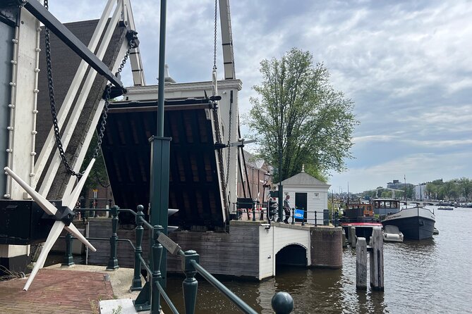 Private Walking Tour of Amsterdam - Rembrandt links and the Netherlands’ first pretty station
