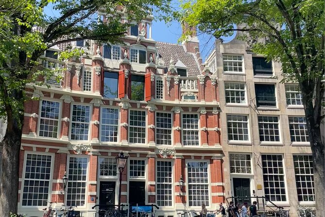 Private Walking Tour of Amsterdam - Anne Frank house pass, Jordaan streets, and an old city gate