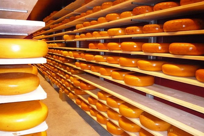 Private Zaanse Schans & Volendam Tour: Windmills, Cheese & Clogs - Entering Zaanse Schans: Paint mills, sawmills, and clogs in one sweep