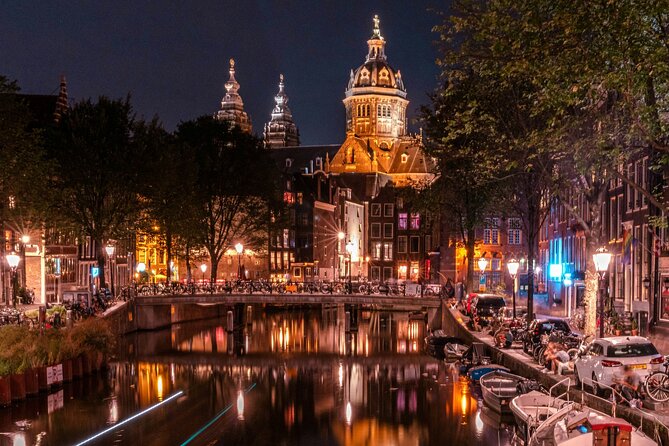 Red Light District Tour - It's History & It's Future - Weeping Tower and St. Nicholas Basilica: the past shows up fast
