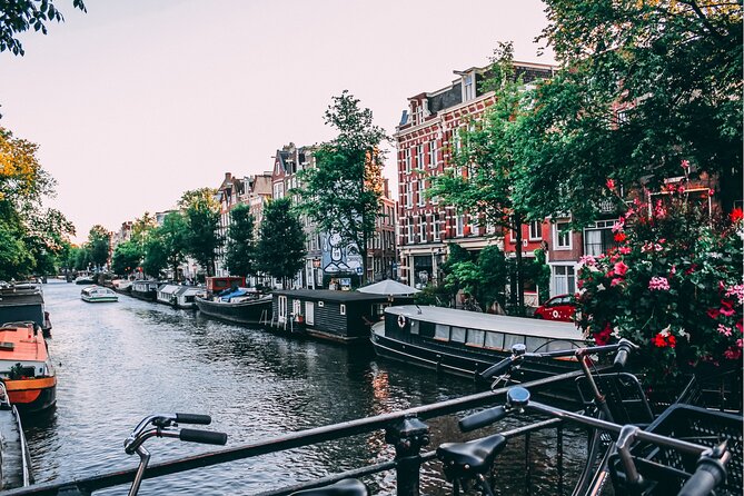 Self-guided city walking tour in Amsterdam - Beurs van Berlage, Damrak, and the Westerkerk approach