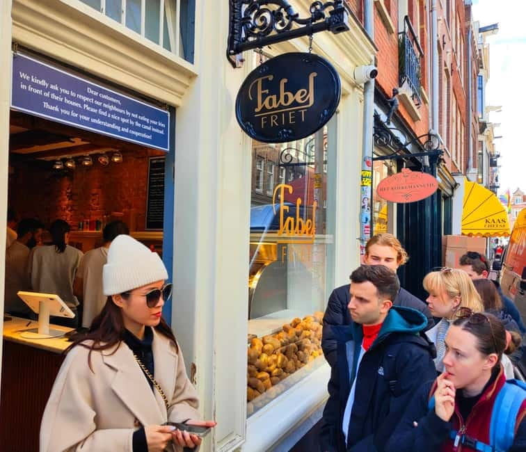 Skipping Lines & Sipping Beers: A History Tour of Amsterdam - Ferry Ride to North Amsterdam Near Central Station
