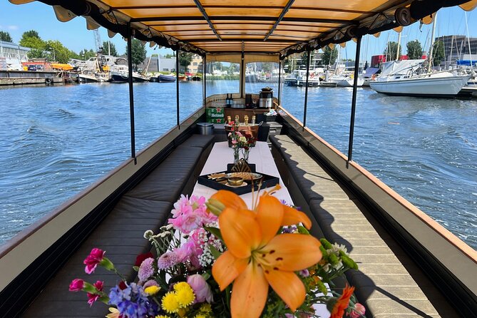 Small-Group Luxury Canal Cruise with Local Skipper - Charmed historic canals: how you spot Amsterdam’s quieter side